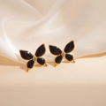 Aretes de mariposas negras