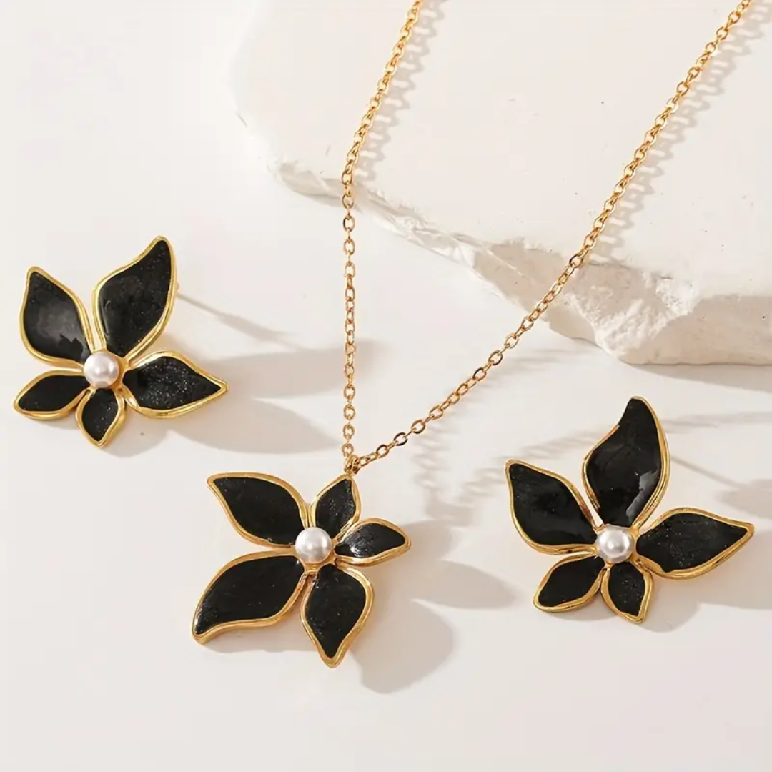 Conjunto negro con dorado de flores