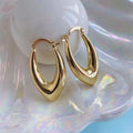 Aretes Reflejo de Oro dorados