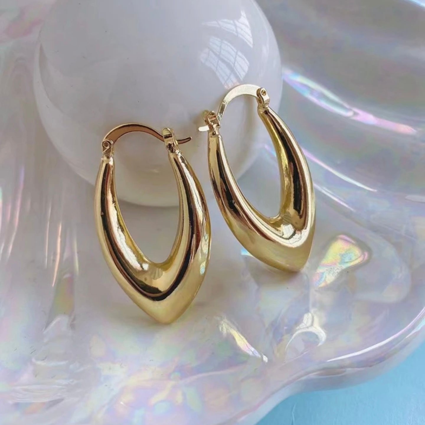 Aretes Reflejo de Oro dorados