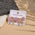 Aretes Alas de Mariposa Lila