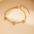 Pulsera doble dorada de estrella