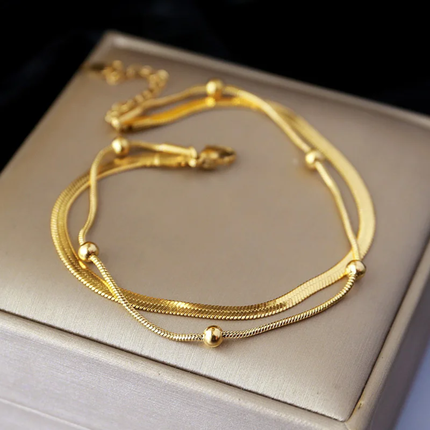 Pulsera doble dorada