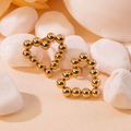 Aretes Corazón de Perlas Dorada.