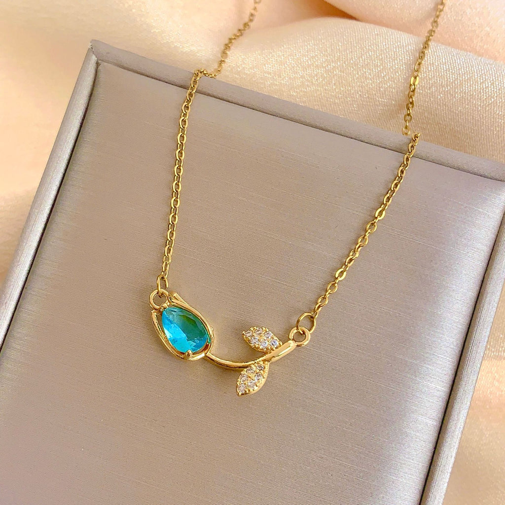 Cadena de tulipan con petalo en forma de gota azul