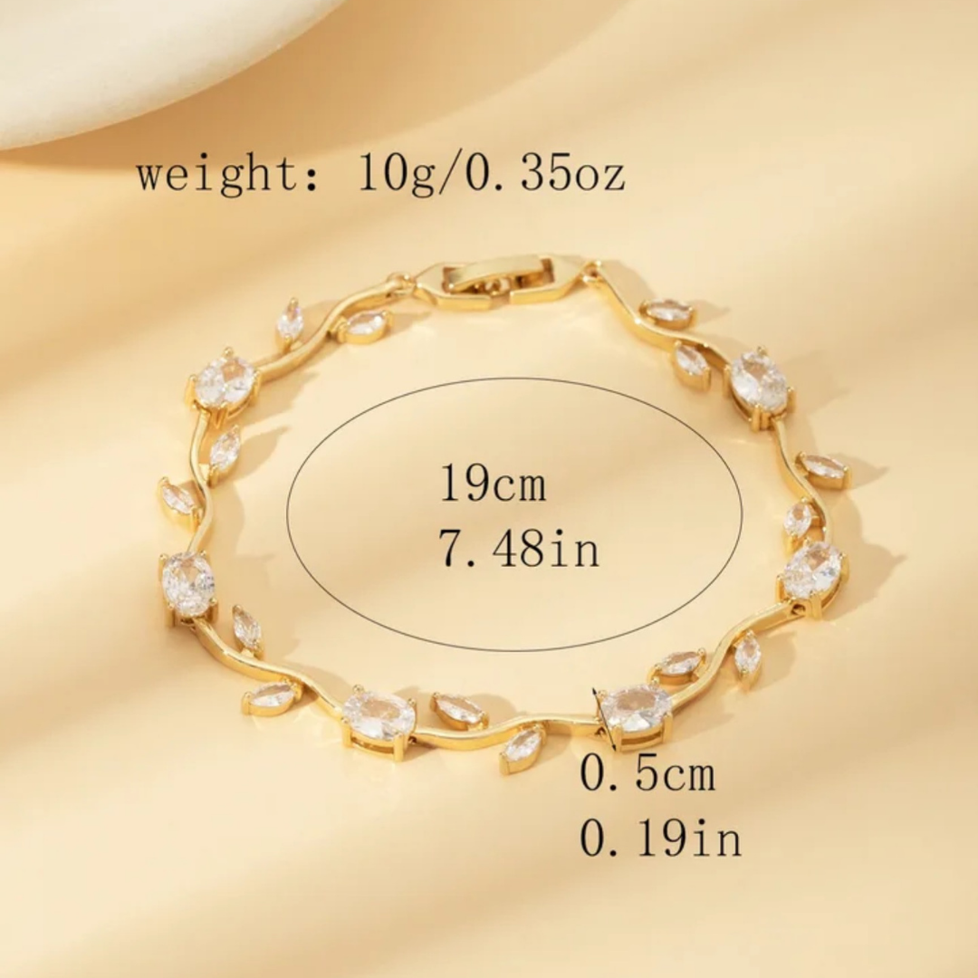 Pulsera con piedras blancas dorado
