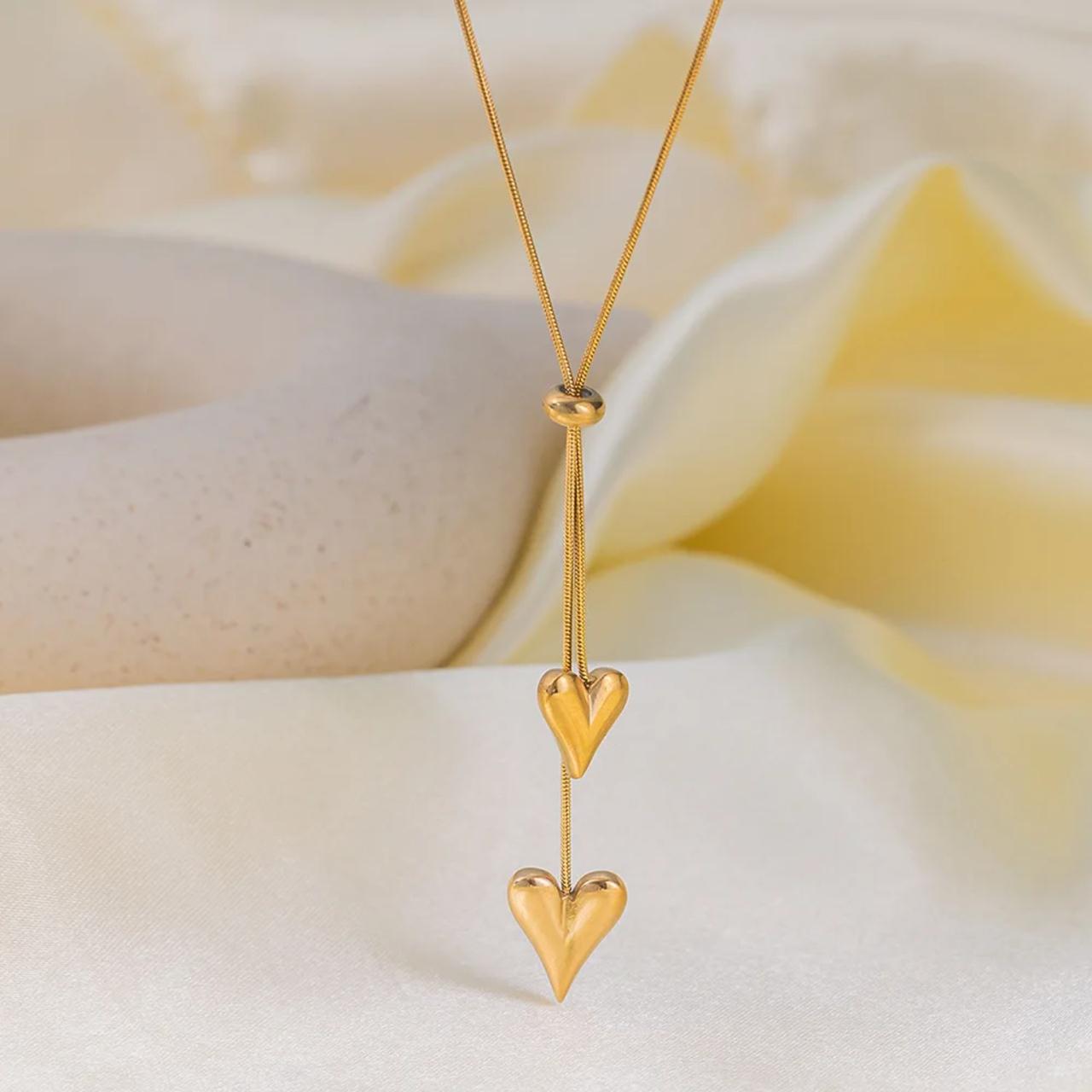 Cadena de corazón doble dorado (tipo corbata