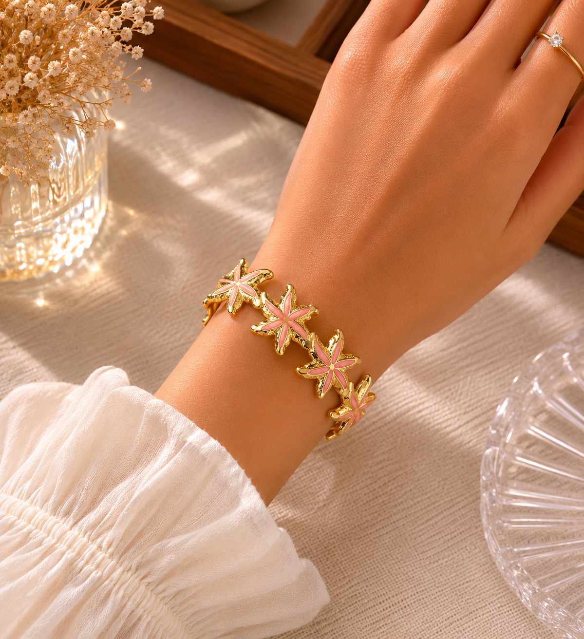Brazalete Estrellas de Mar Esmalte Rosado Dorado