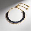 Pulsera dorada azul
