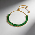 Pulsera dorada verde