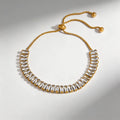 Pulsera dorada blanco