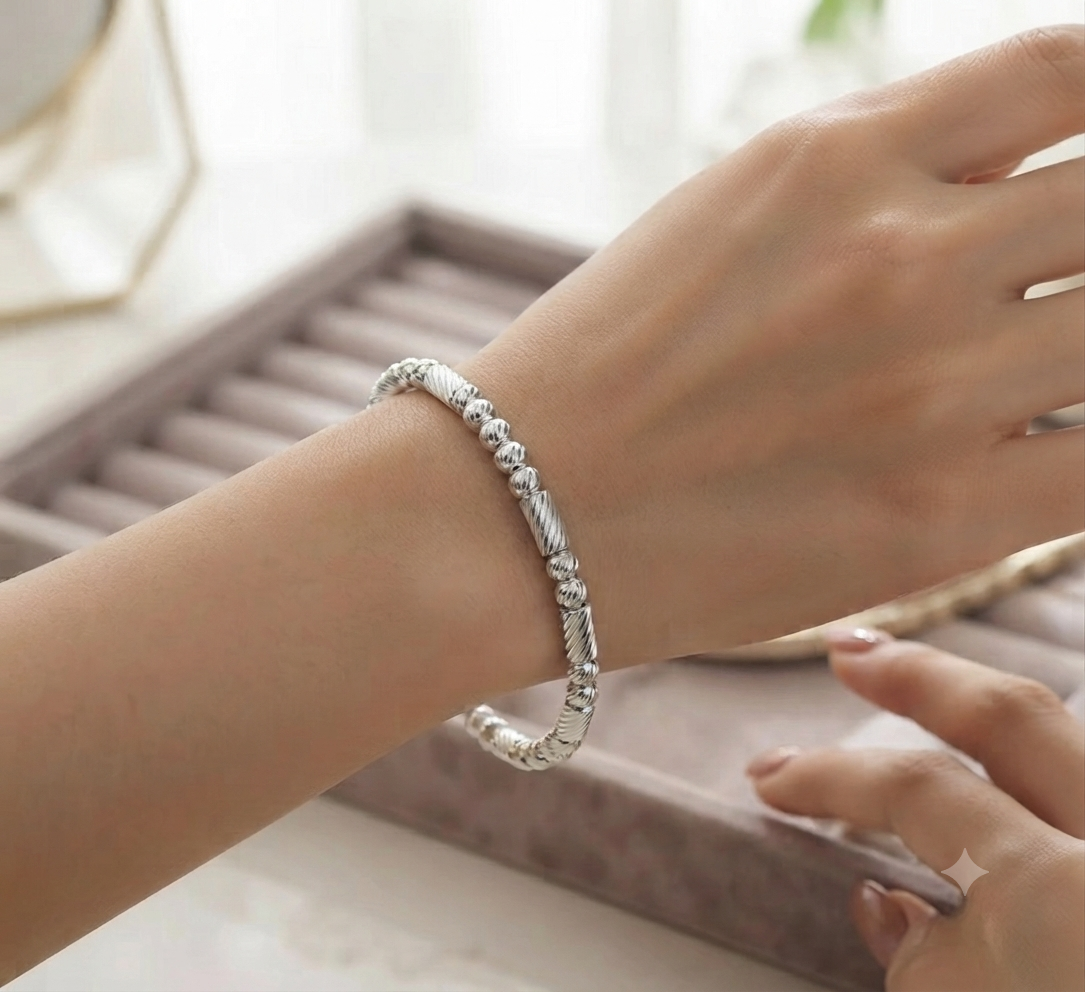 Pulsera Rígida Espiral Baguette Plateada