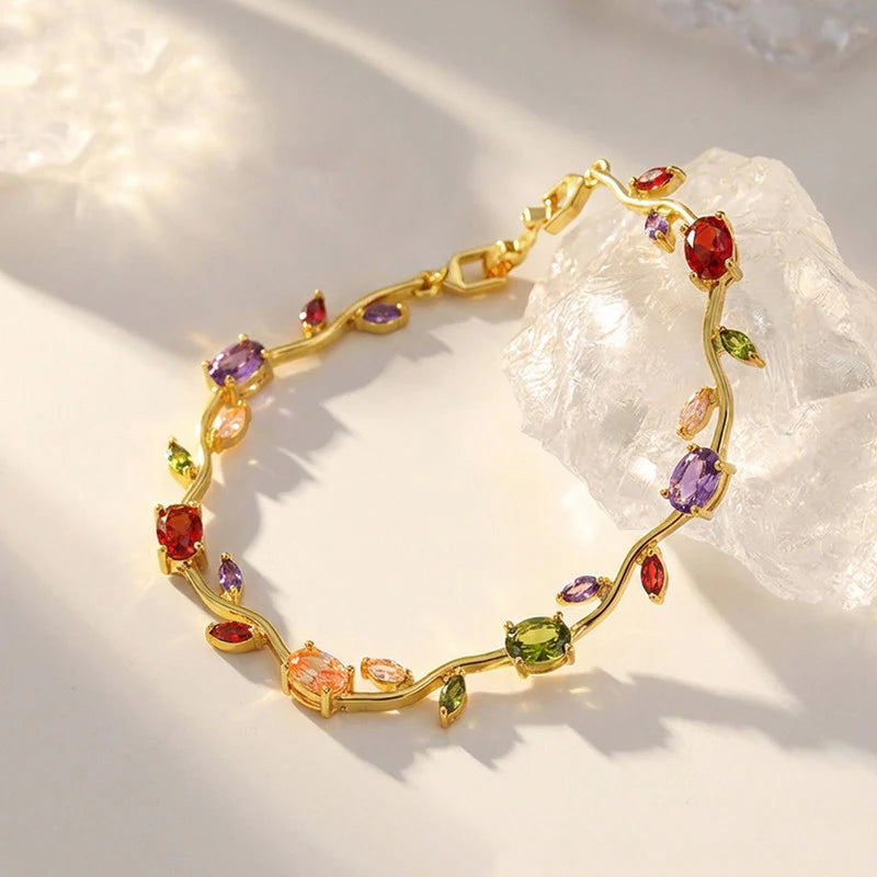 Pulsera con piedra varios colores dorado