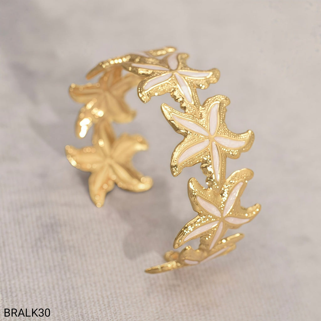 Brazalete Estrellas de Mar Esmalte Blanco Dorado