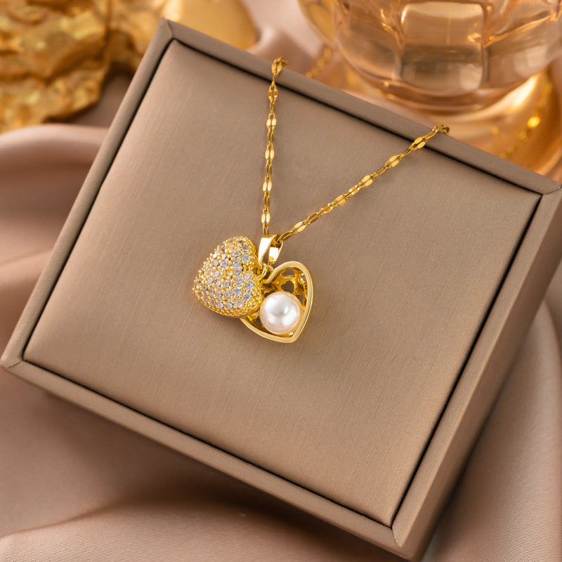 Cadena con corazón y perla