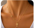 Cadena con inicial U y cruz