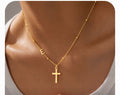 Cadena con inicial E y cruz