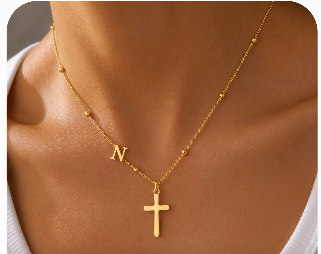 Cadena con inicial N y cruz