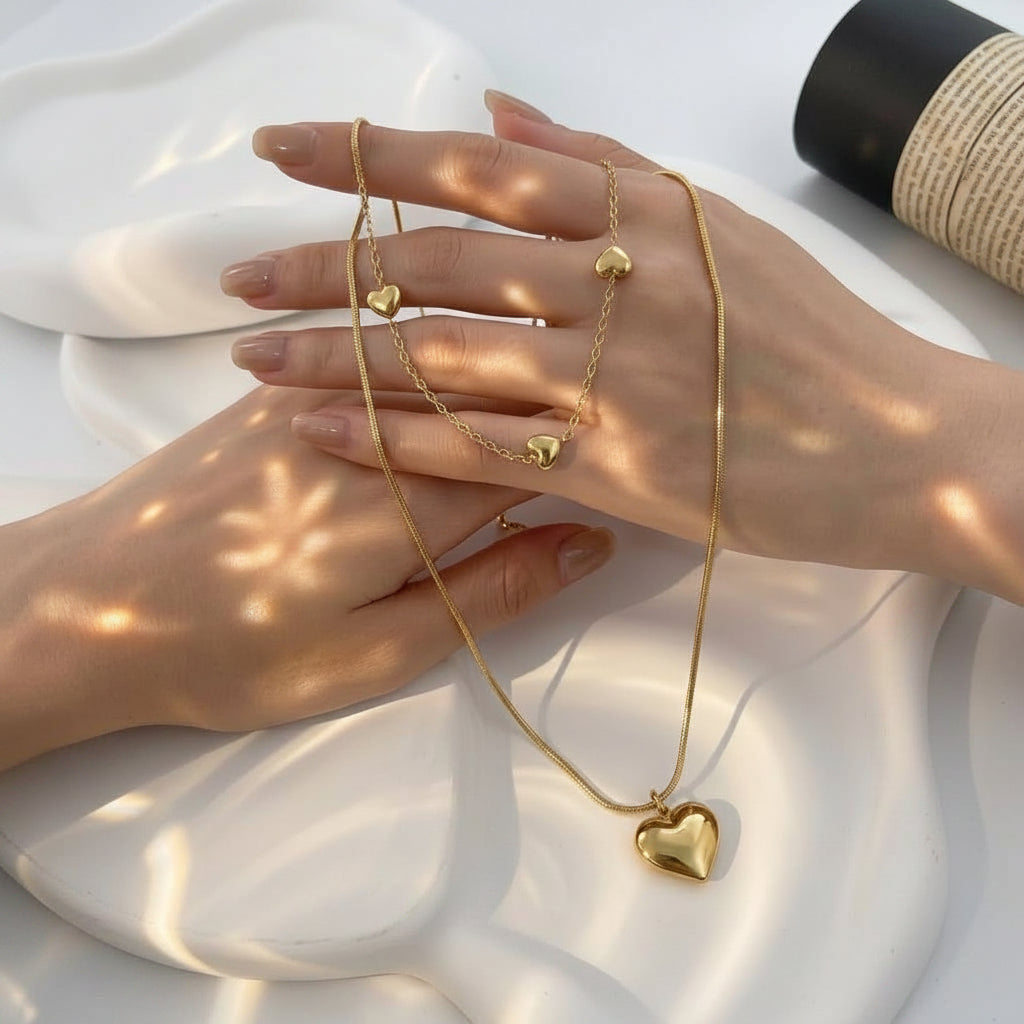 Cadena Doble plana y corazón dorado