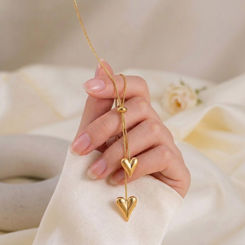 Cadena de corazón doble dorado (tipo corbata